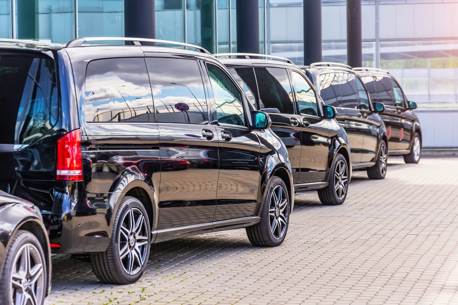 PJ Chauffeurs Mercedes minibuses at Liverpool football stadium, ready for VIP group transport